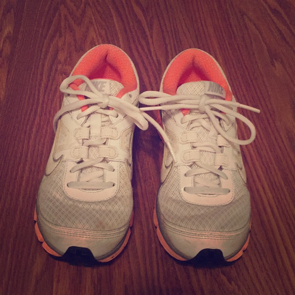White Nike’s with coral sole